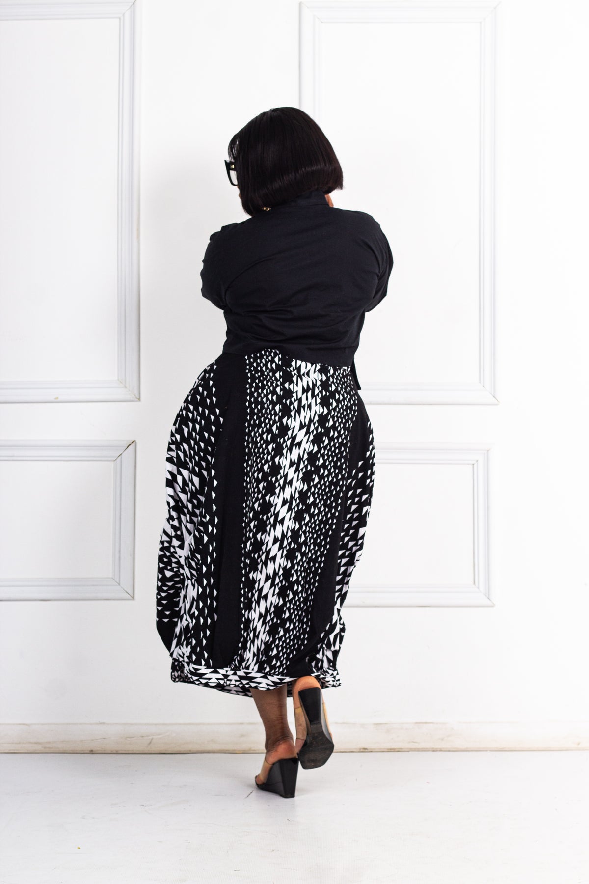 Wax skirt and poplin shirt
