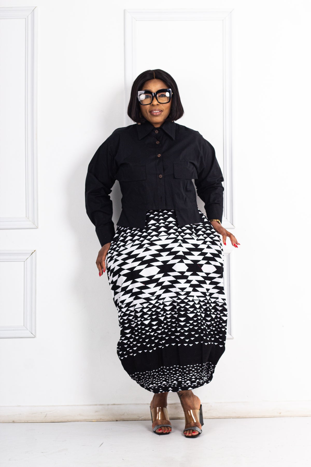 Wax skirt and poplin shirt