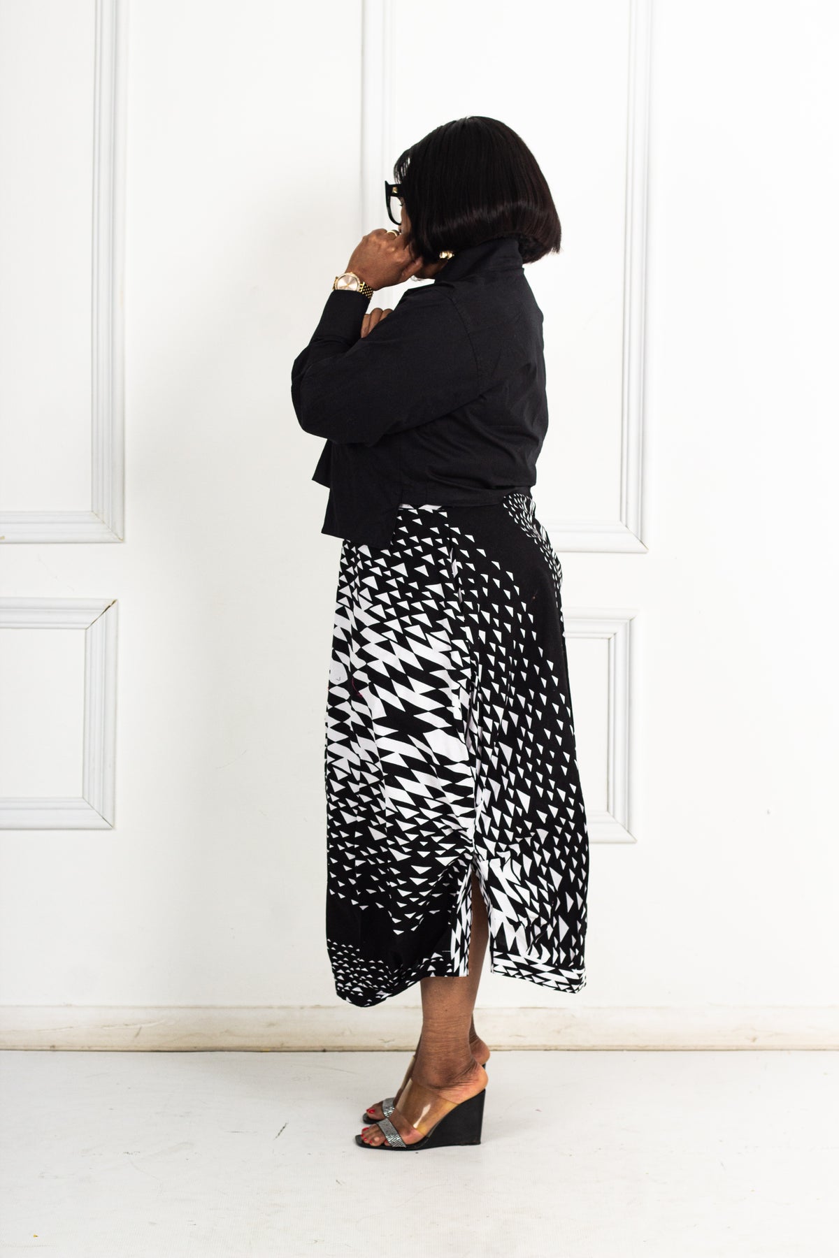 Wax skirt and poplin shirt